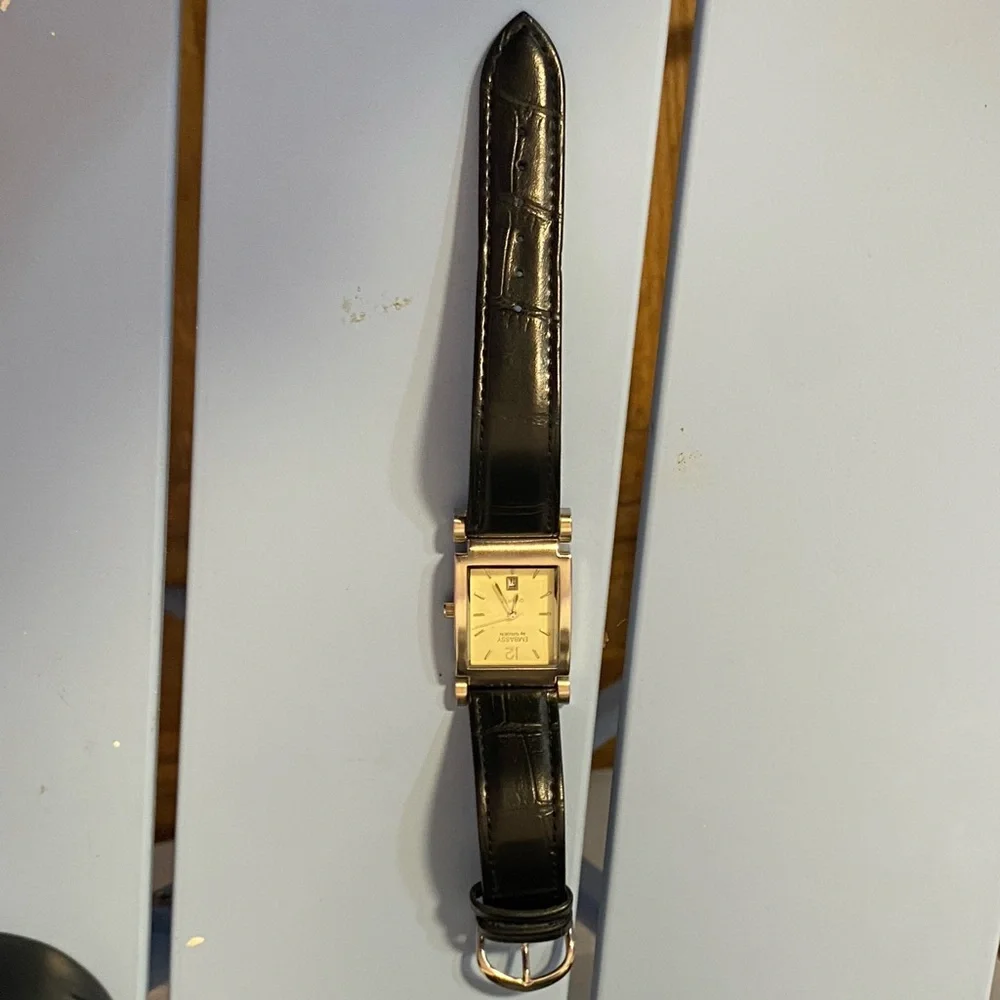 Embassy by Gruen Quartz Gold Tone Rectangular Watch Black Leather Band